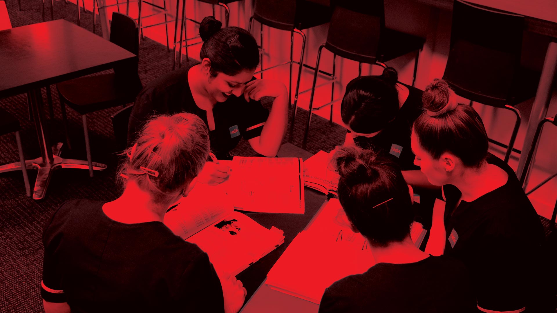 Beauty students studying anatomy and physiology in the New Zealand Certificate in Beauty Therapy course at The National School of Aesthetics