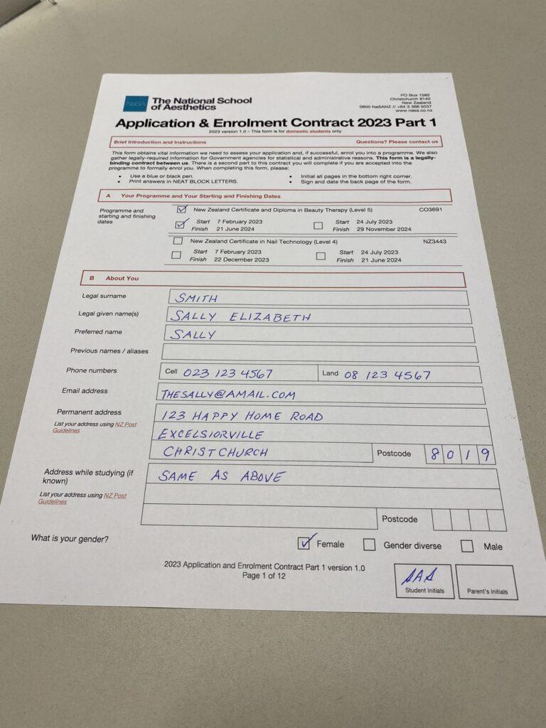 An example of an unacceptable photo of an application form. The form is on a very bad angle, and there is a large margin of space around the form itself.