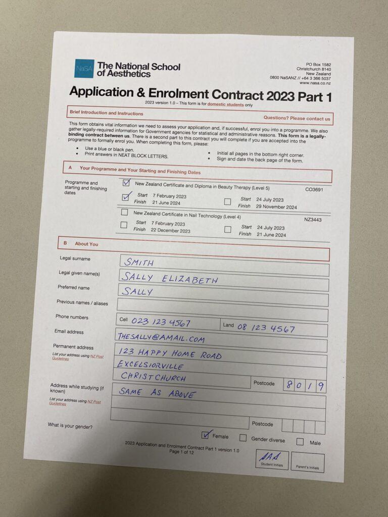 An example of an unacceptable photo of an application form. There is a shadow across the photo and the form is on an angle with a wide margin around the paper.